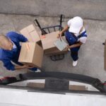 full-shot-delivery-people-top-view-scaled
